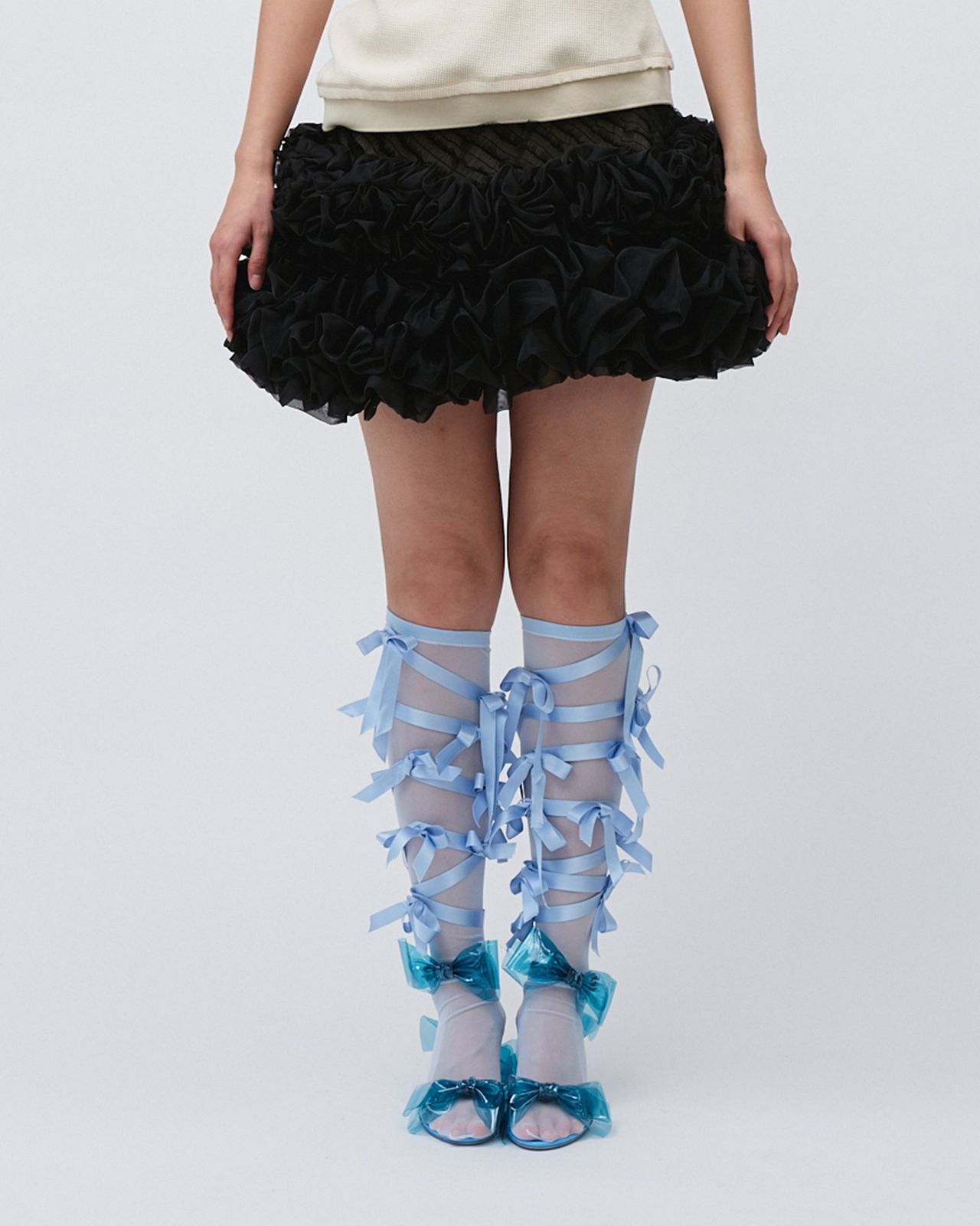 SMOCKED RUFFLE MINI SKIRT