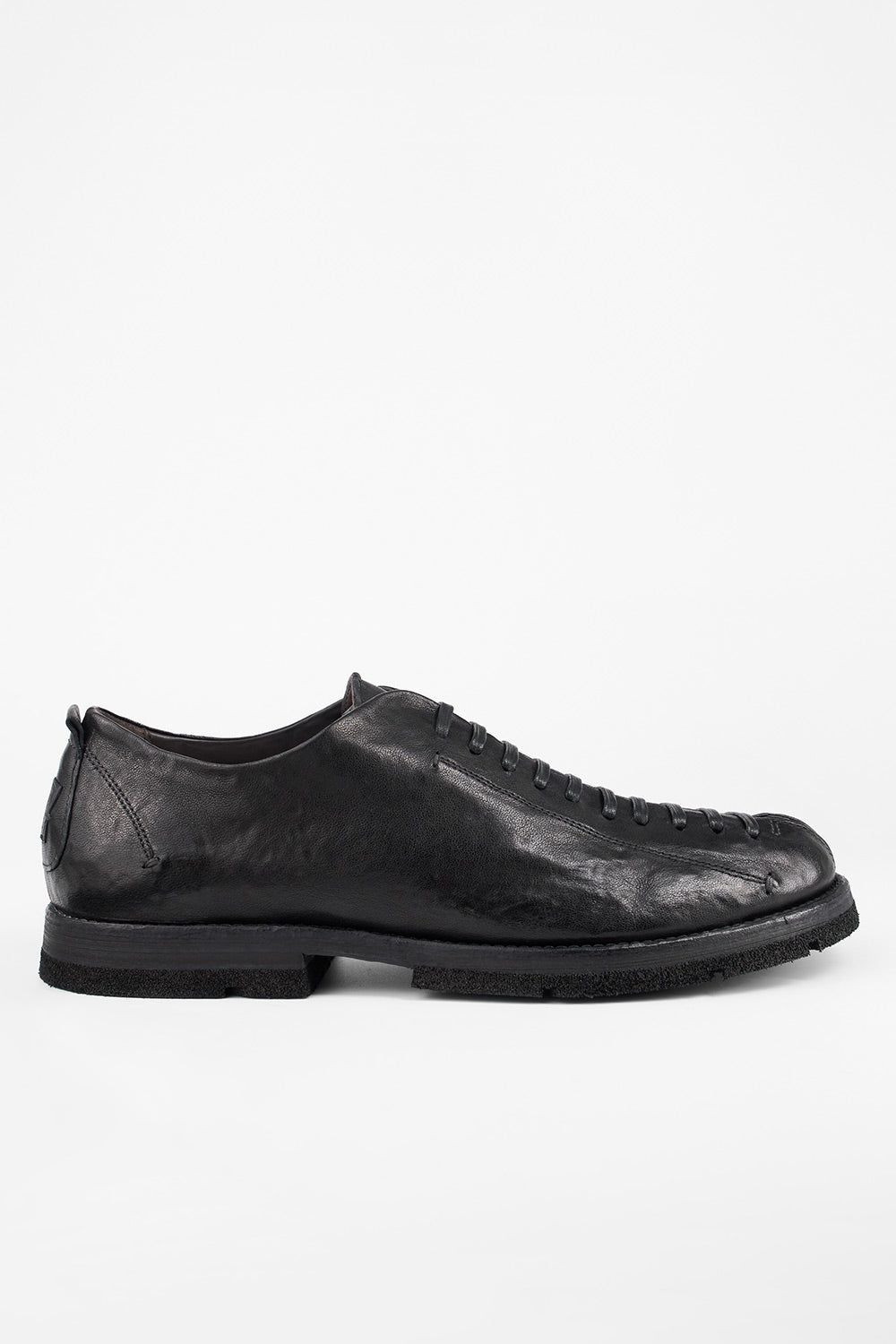 HARVEY rugged-black tip-laced shoes.