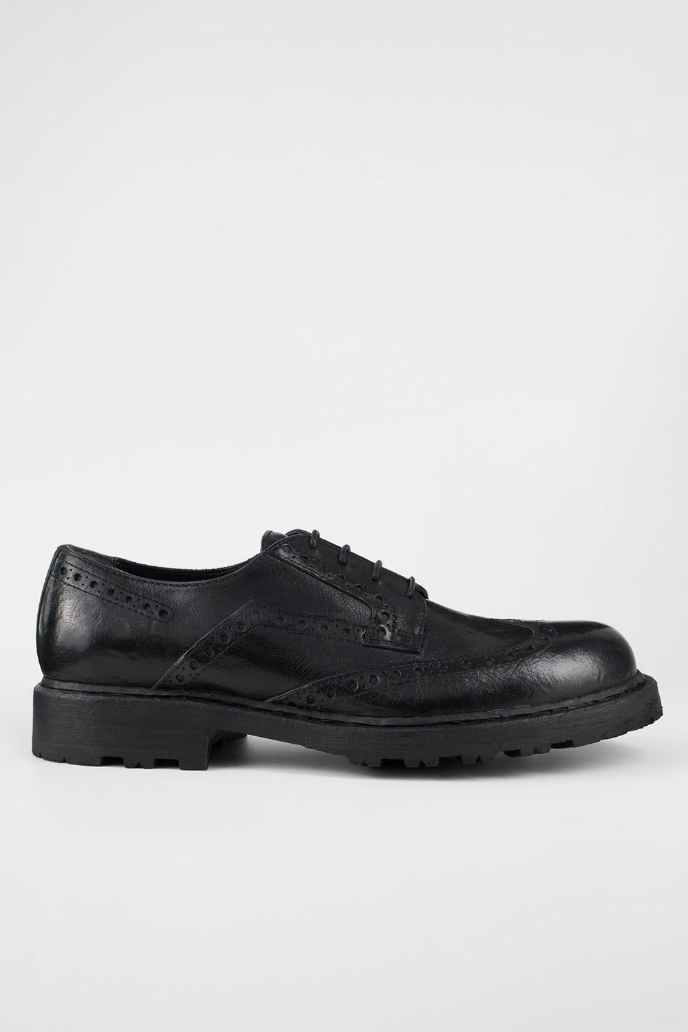 DRAKE jet-black brogue derby shoes.