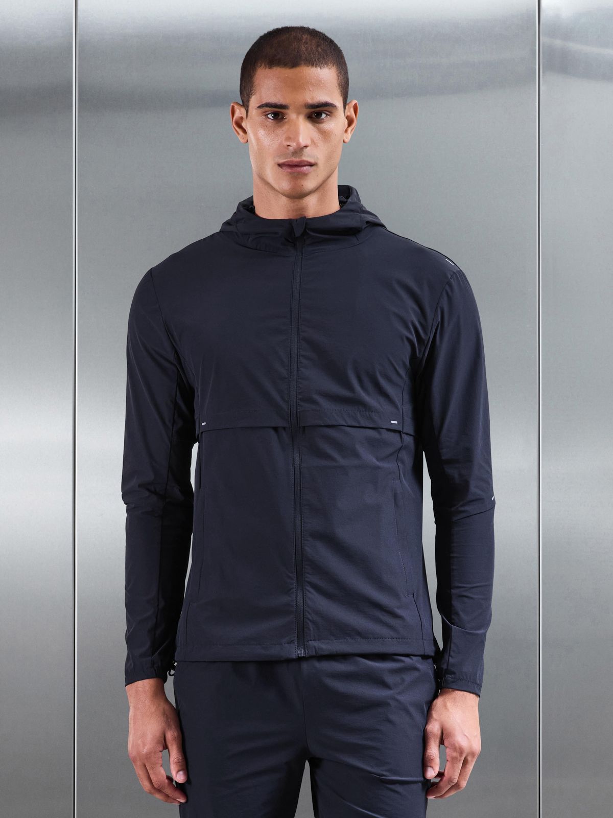 Performance Windbreaker in Navy
