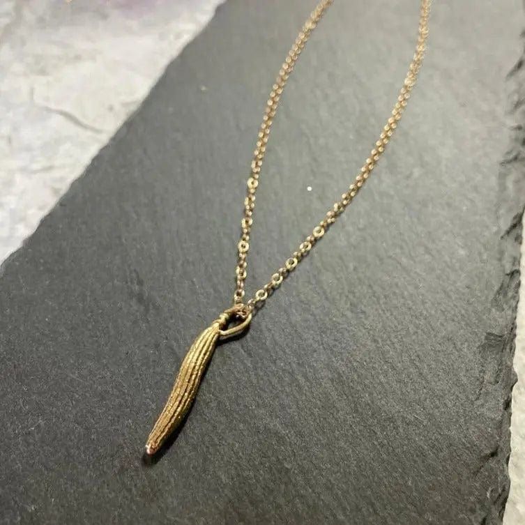 Miniature Gold Molokhia Seed Pod Pendant