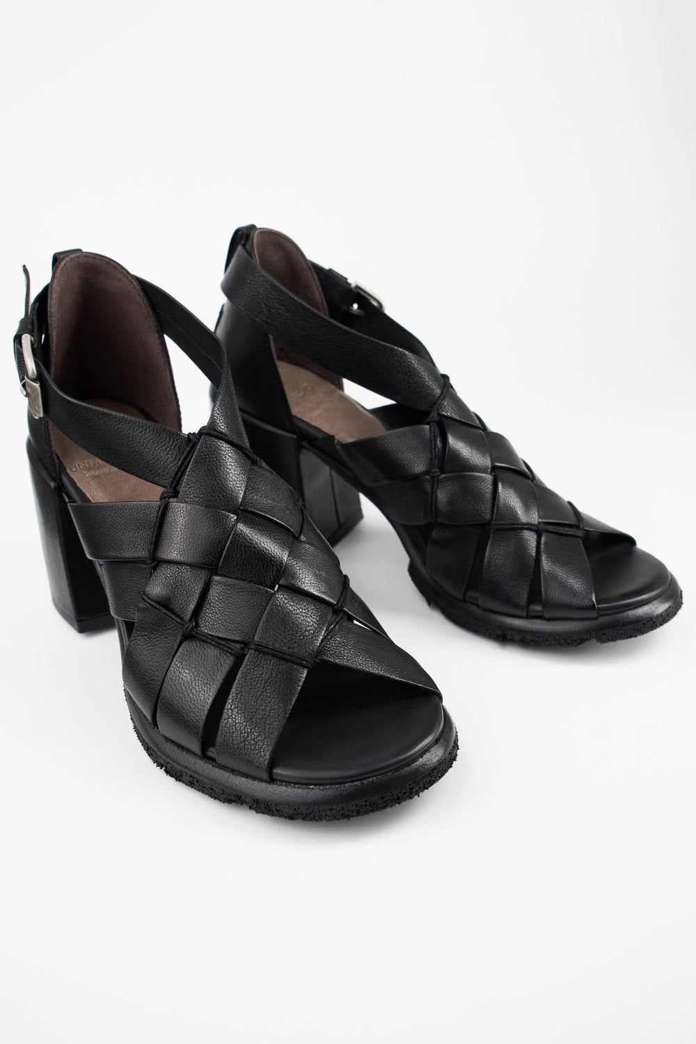 SHELLEY jet-black woven mid heel sandals.